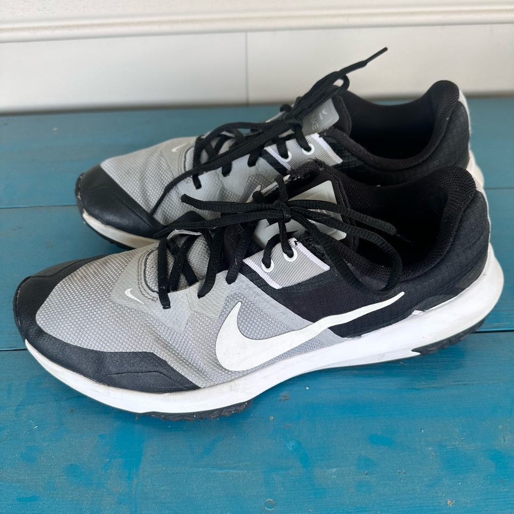Nike Black and Gray Athletic Shoes with Swoosh Logo